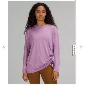 Lululemon size 2 purple long sleeve. Cinched at side.